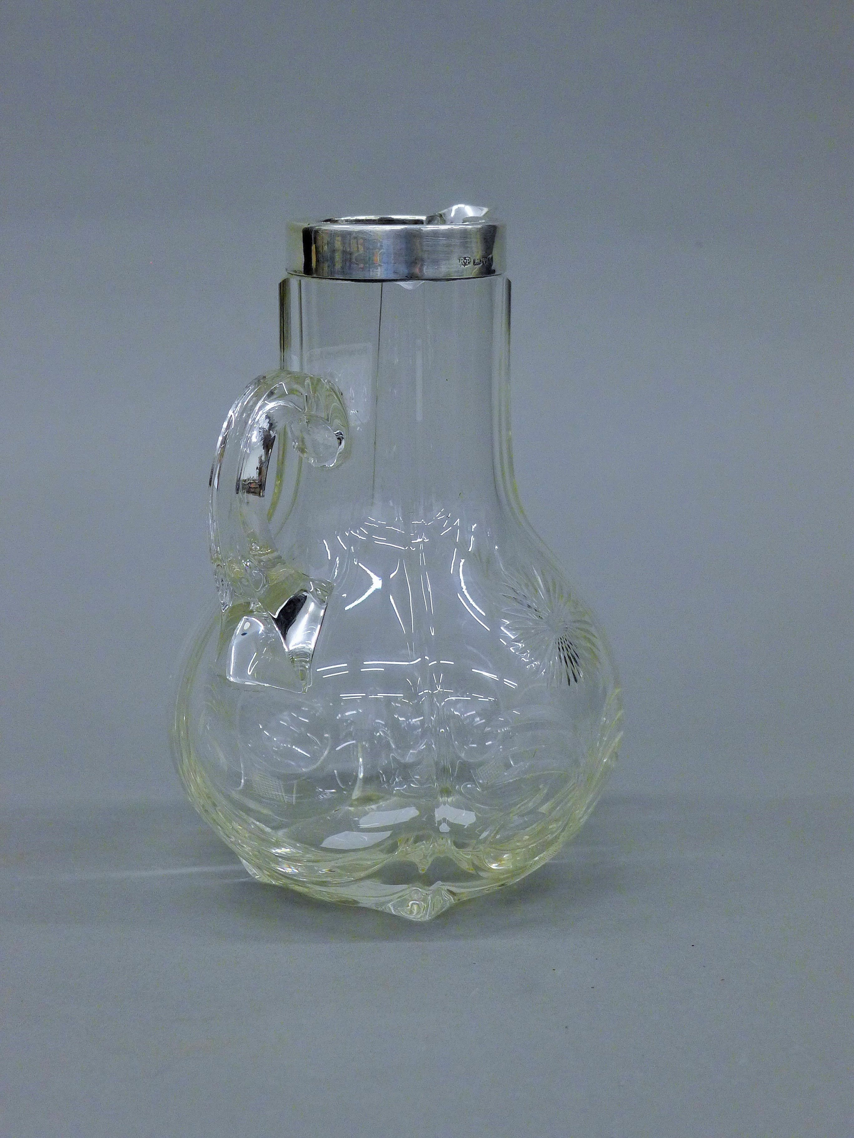 A silver rimmed and glass claret jug, hallmarked for Chester 1901 by Robert Pringle and Son. - Image 3 of 4