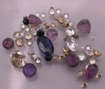 A quantity of various gemstones, diamonds, sapphires, etc.