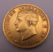 A 40 Lire gold coin. 12.9 grammes.
