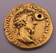 An Aureus gold Roman coin. 7.1 grammes.
