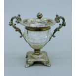 A Continental silver mounted cut glass bon bon dish. 23 cm high.