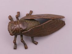 A bronze model of a fly. 4.5 cm long.
