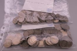 A quantity of one shilling coins.