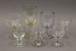 A collection of 19th century and later glass goblets. The largest 22 cm high.