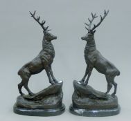 A pair of bronze stags. 43.5 cm high.