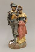 An Austrian pottery figural group. 38 cm high.