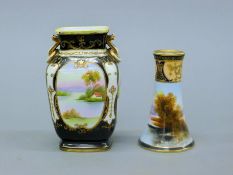 A Noritake vase and hat pin holder, both decorated with scenery. The former 15 cm high.