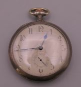 A silver Omega Grand Prix Paris 1900 pocket watch, in working order. 5.25 cm diameter.