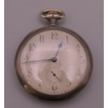 A silver Omega Grand Prix Paris 1900 pocket watch, in working order. 5.25 cm diameter.