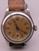 A gentleman's military wristwatch. 3.25 cm wide.