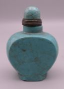 A turquoise snuff bottle. 6 cm high.