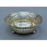 An American sterling silver pierced bon bon dish, circa 1920. 12 cm diameter. 69.2 grammes.