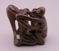 An erotic netsuke. 4 cm high.