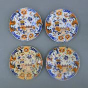 A set of four 19th century child's Ironstone type plates. 10.5 cm diameter.