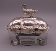 A Georgian silver mounted glass box, the finial formed as a goose. 9 cm long.