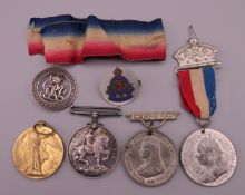 A collection of various medals, two awarded to 18102 CPL. P.D. EDWARDS D.C.L.I.