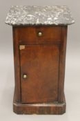 A 19th century marble topped mahogany pot cupboard. 43 cm wide.
