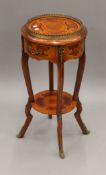 A modern inlaid circular two-tier side table. 80 cm high.