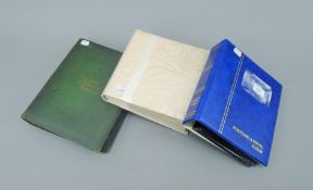 Three postcard albums.