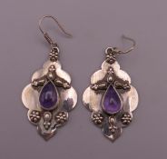 A pair of silver and amethyst earrings. 5 cm high overall.
