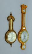 Two barometers. The largest 72 cm high.