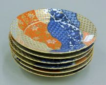 Six Imari dishes. 16.5 cm diameter.