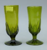 A pair of green Art glass goblets. 17.5 cm high.