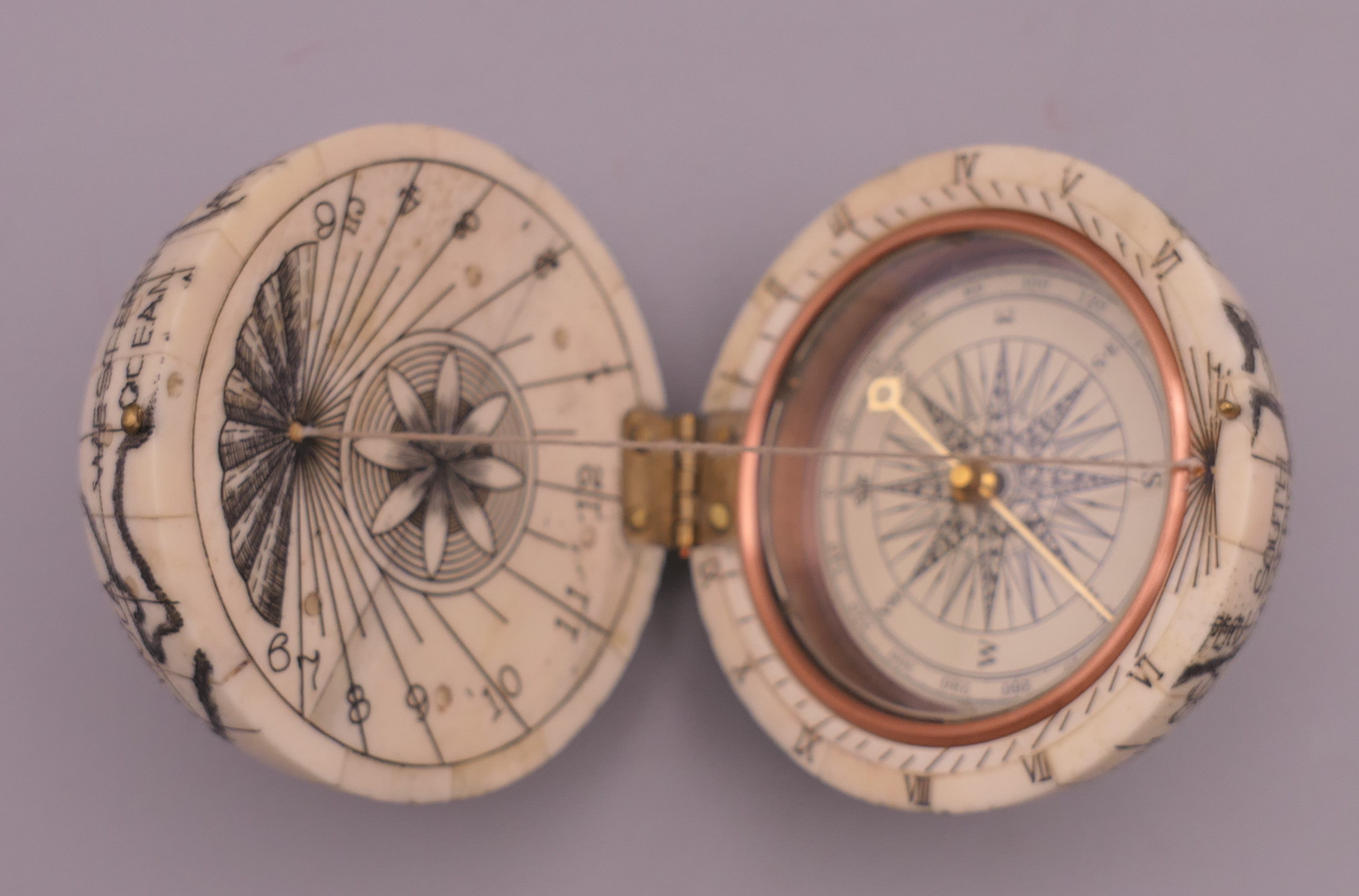 A globe form compass. 6 cm high. - Image 2 of 6