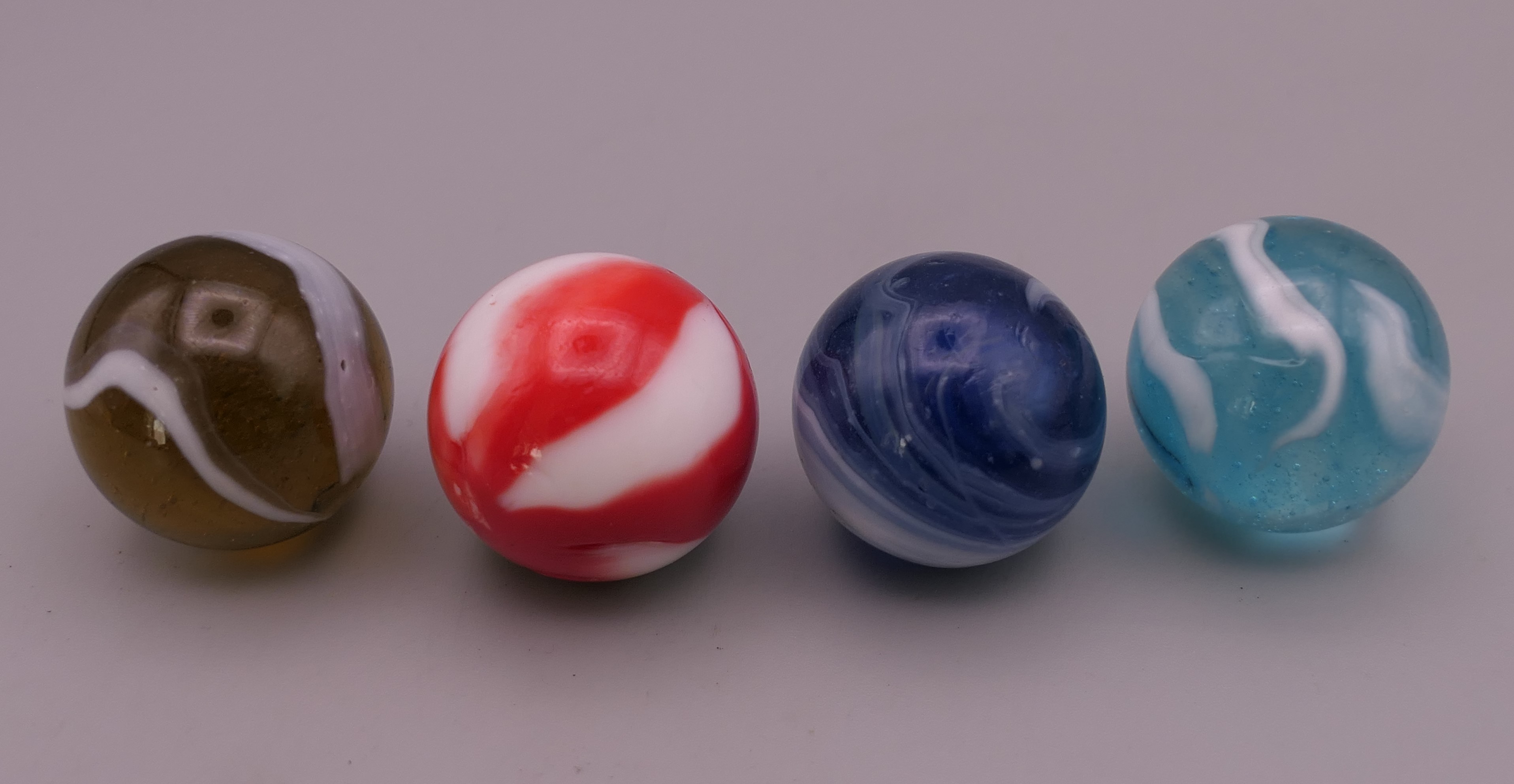 Four antique glass marbles (three approximately 1 inch diameter and the other 15/16th of an inch - Image 6 of 14