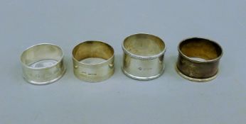 Four various silver napkin rings. 77.1 grammes.