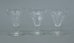 Three 19th century glasses. 14 cm high.