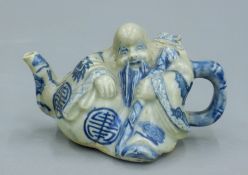 Two Chinese porcelain figural teapots. The largest 16 cm long.