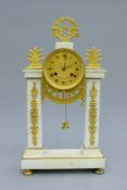 A gilt bronze and white marble portico clock. 42 cm high.