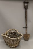 A vintage peat spade and a potato basket. The former 93.5 cm high.