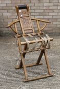 A Chinese folding chair. 76 cm wide.