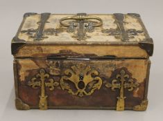A 17th century brass bound casket. 23 cm wide.
