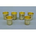 Six Continental silver shoot cups. Each 4 cm high. 105.6 grammes.