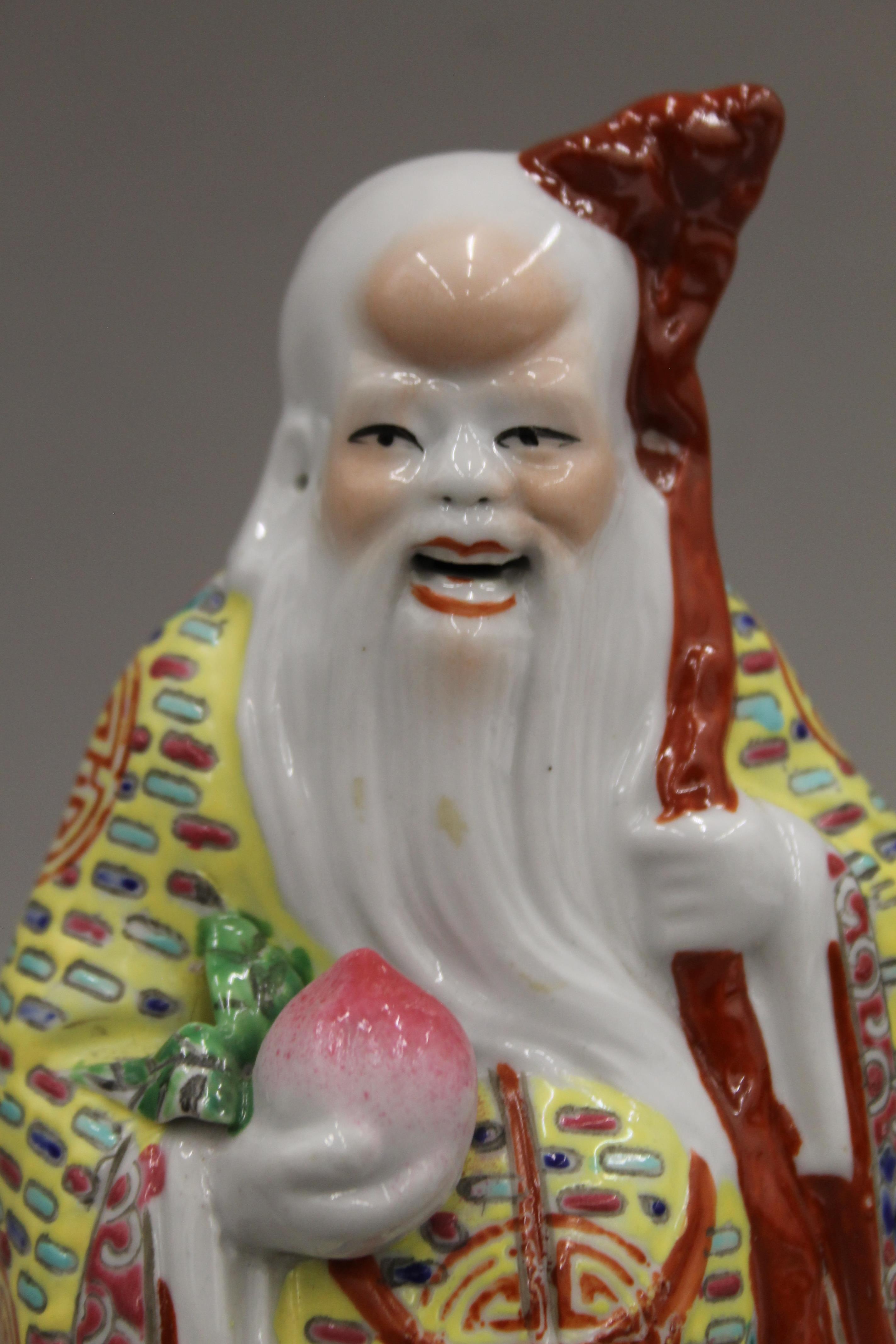 Two Chinese porcelain figures. The largest 21.5 cm high. - Image 8 of 10