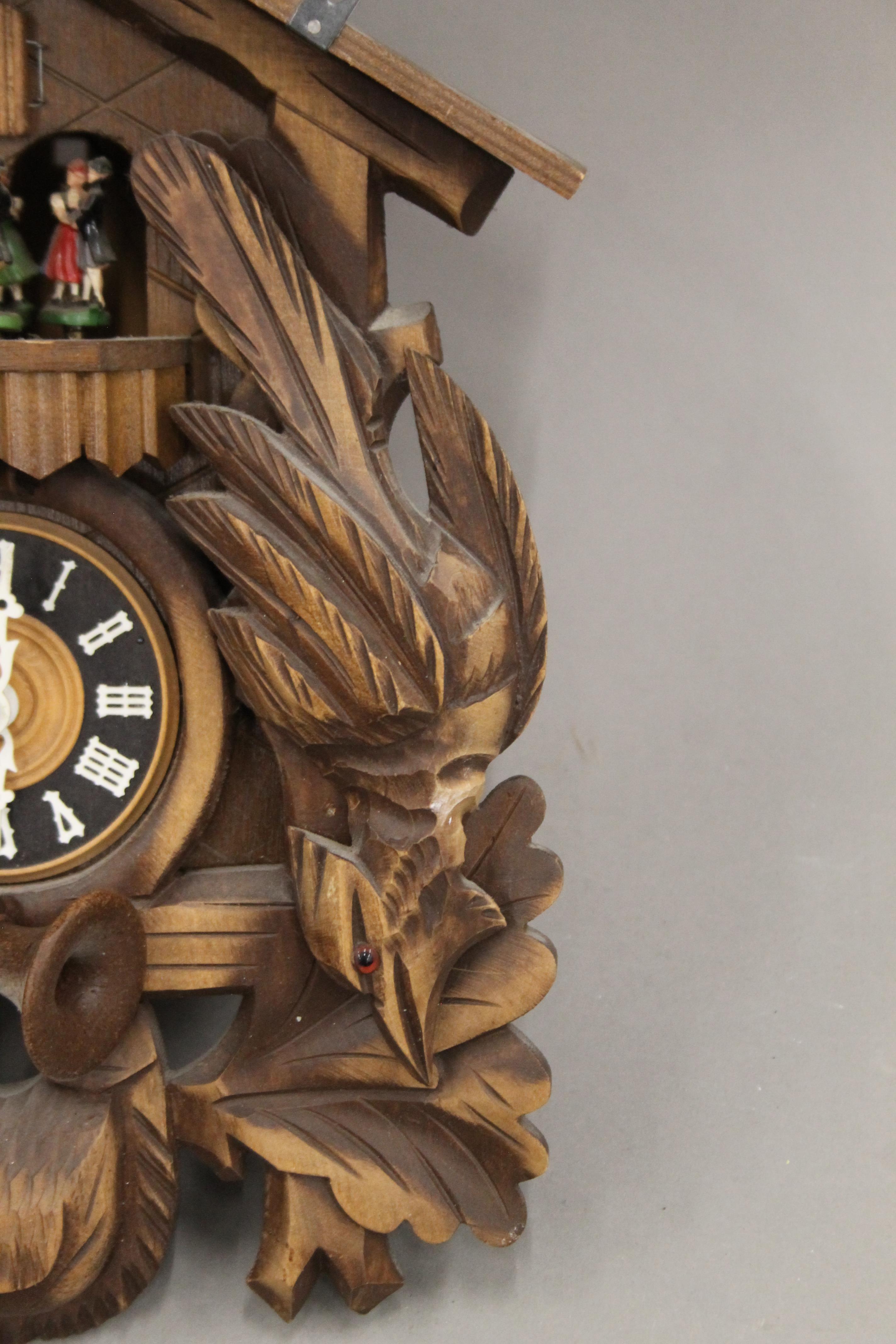 A Blackforest cuckoo clock with roundabout. Approximately 49 cm high. - Image 6 of 9