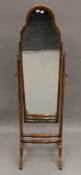 An early 20th century walnut framed cheval mirror. 156 cm high.