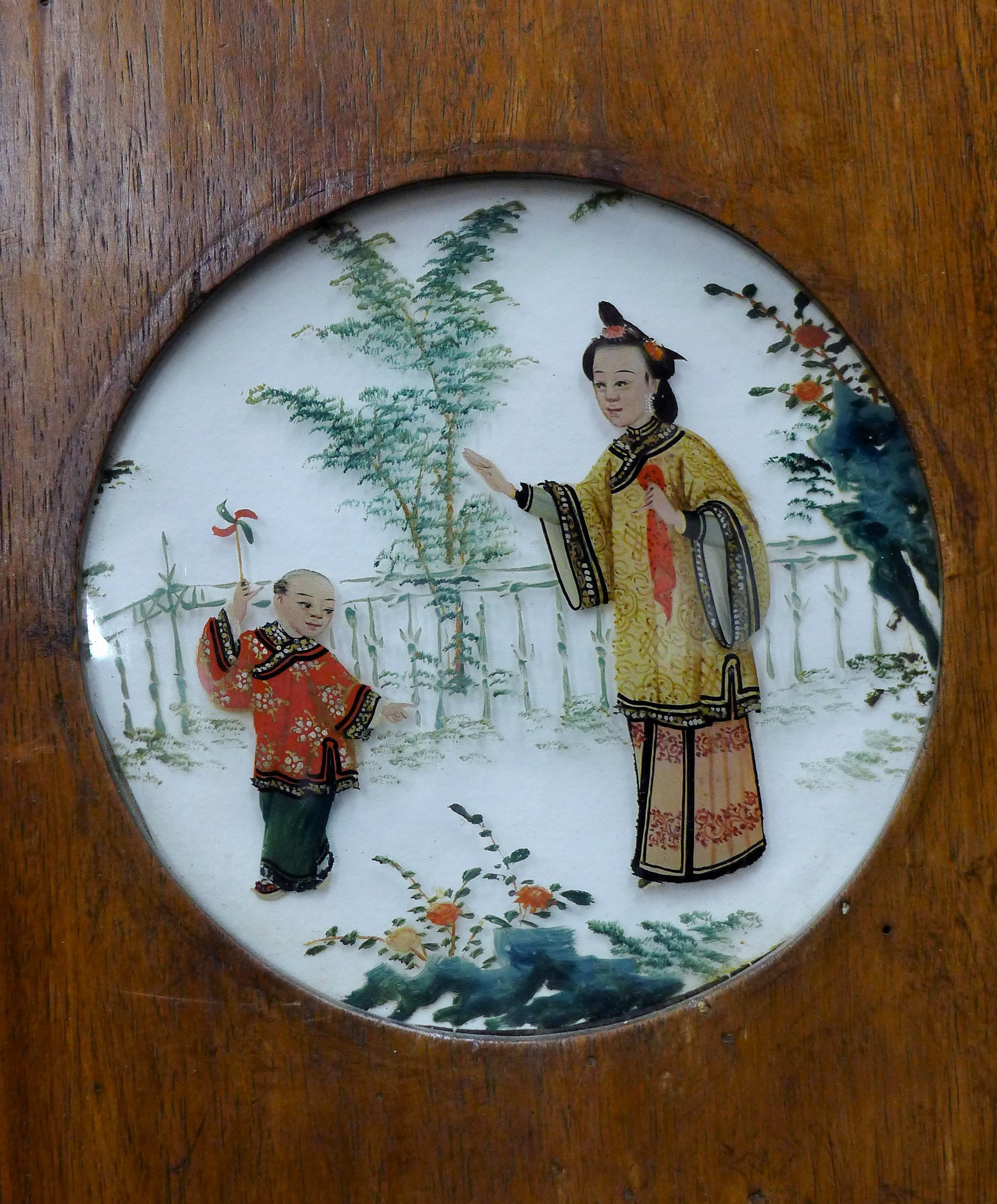 A pair of Chinese hardwood and reverse painted glass panels. Each 26.5 x 88 cm. - Image 3 of 8