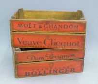 A pair of red champagne boxes. 44 cm long.