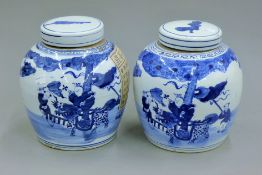 A pair of Chinese porcelain blue and white ginger jars. 24 cm high.