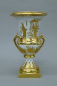 A Paris porcelain gilt decorated urn. 38 cm high.