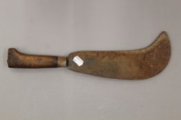 An Army issue machete. 40 cm long.