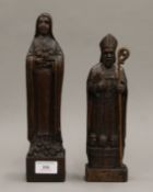 Two late 19th/early 20th century carved oak figures. The largest 29 cm high.
