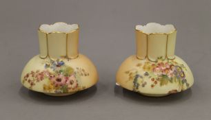 Two Royal Worcester vases. 7.5 cm high.