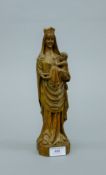 An 18th/19th century carved model of The Madonna and Child. 29.5 cm high.