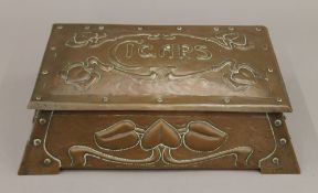 An Arts and Crafts copper cigar box. 29 cm wide.