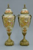 A pair of porcelain vases. 38 cm high.